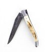 Couteau de Laguiole pliant doubles platines, 12 cm, manche en ivoire de phacochère, mitres inox brossées, lame brute de forge