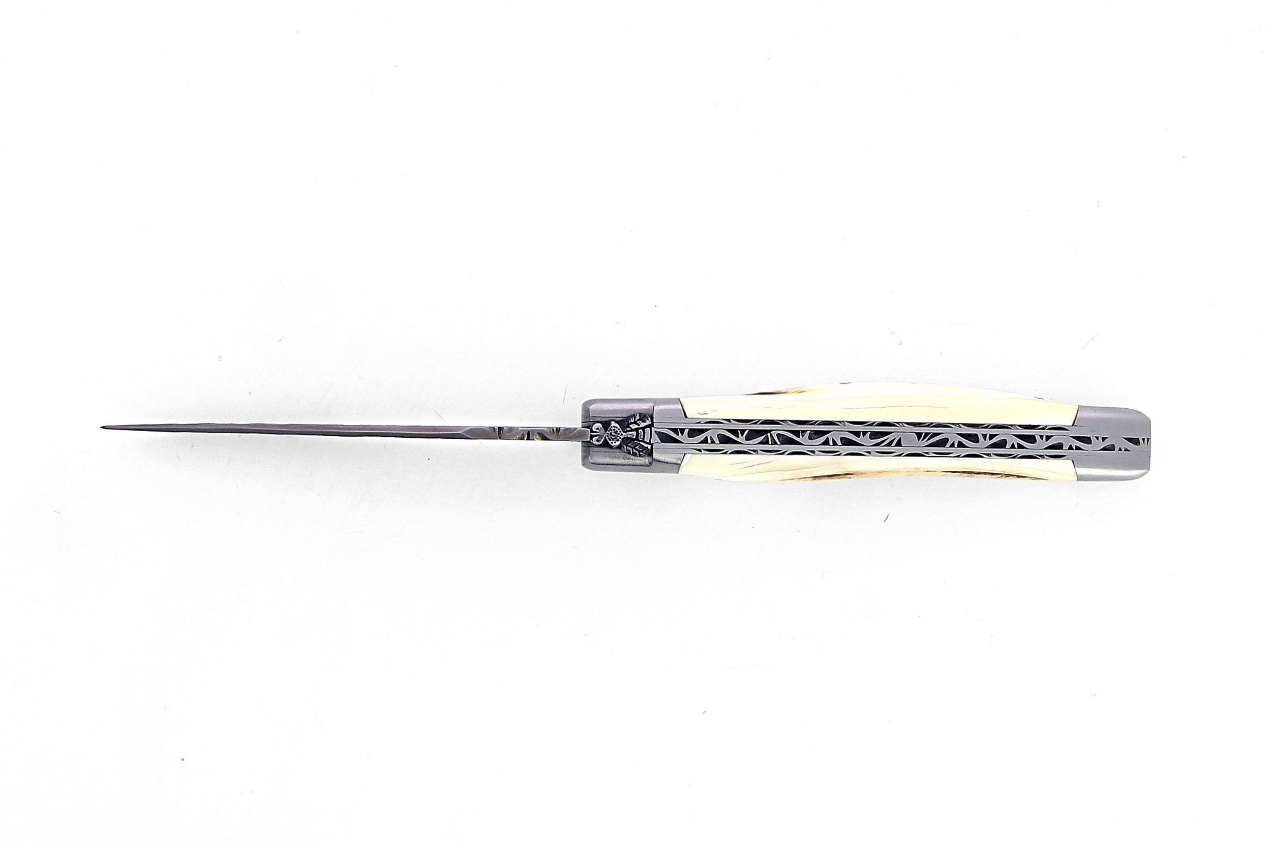 Couteau de Laguiole pliant doubles platines, 12 cm, manche en ivoire de phacochère, mitres inox brossées, lame brute de forge
