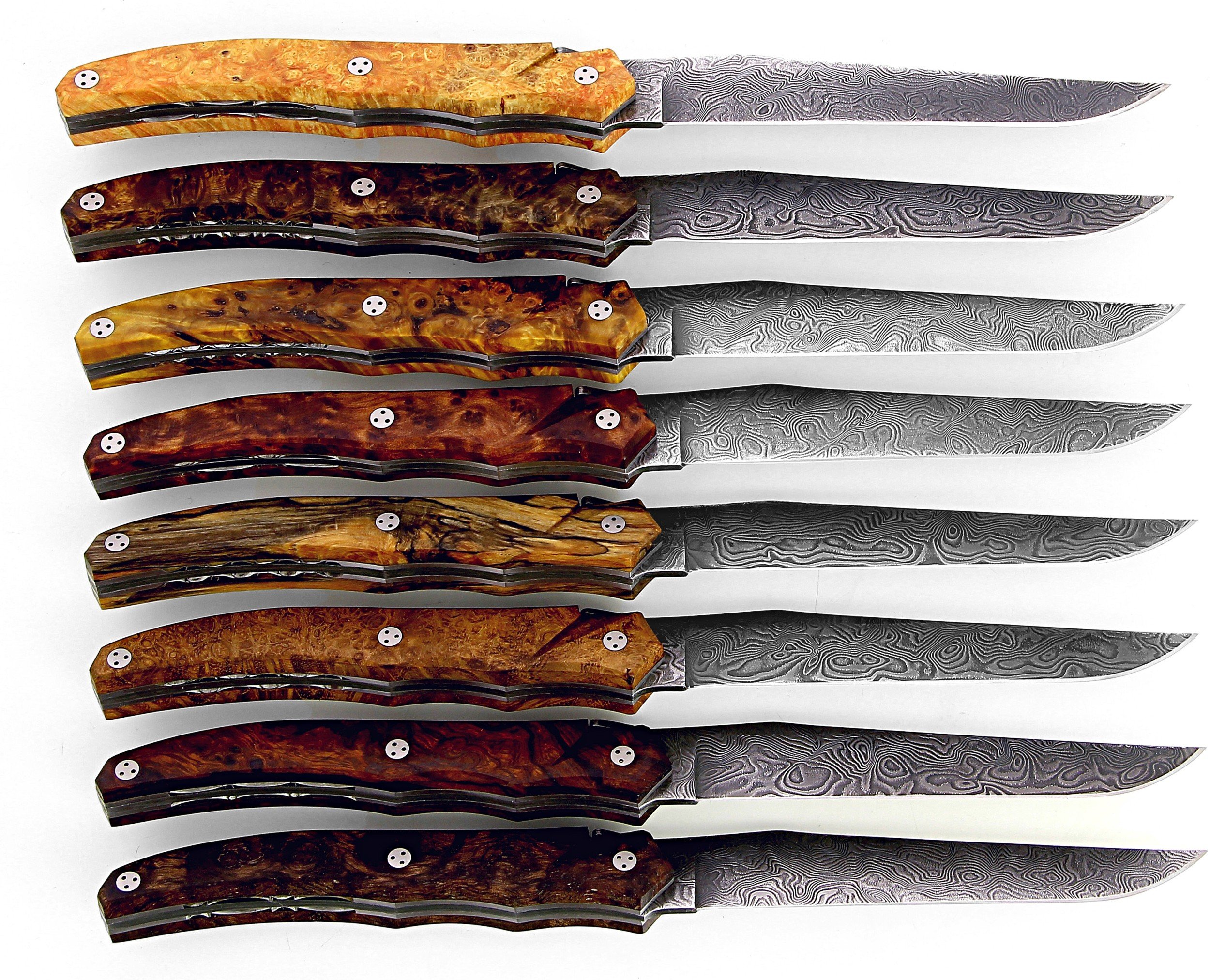 Coffret Laguiole Le Tribal de 8 couteaux de table manche loupe et soies damas inox