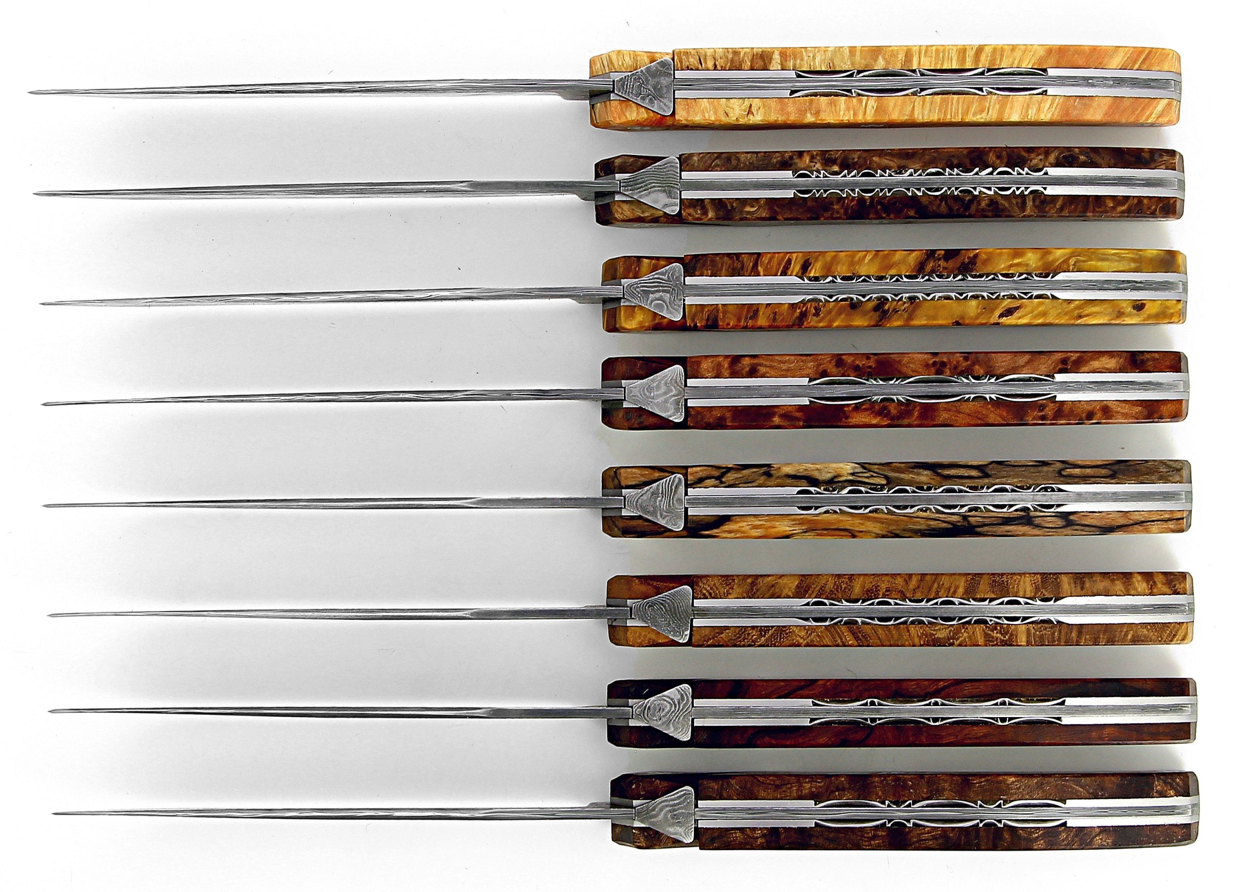 Coffret Laguiole Le Tribal de 8 couteaux de table manche loupe et soies damas inox