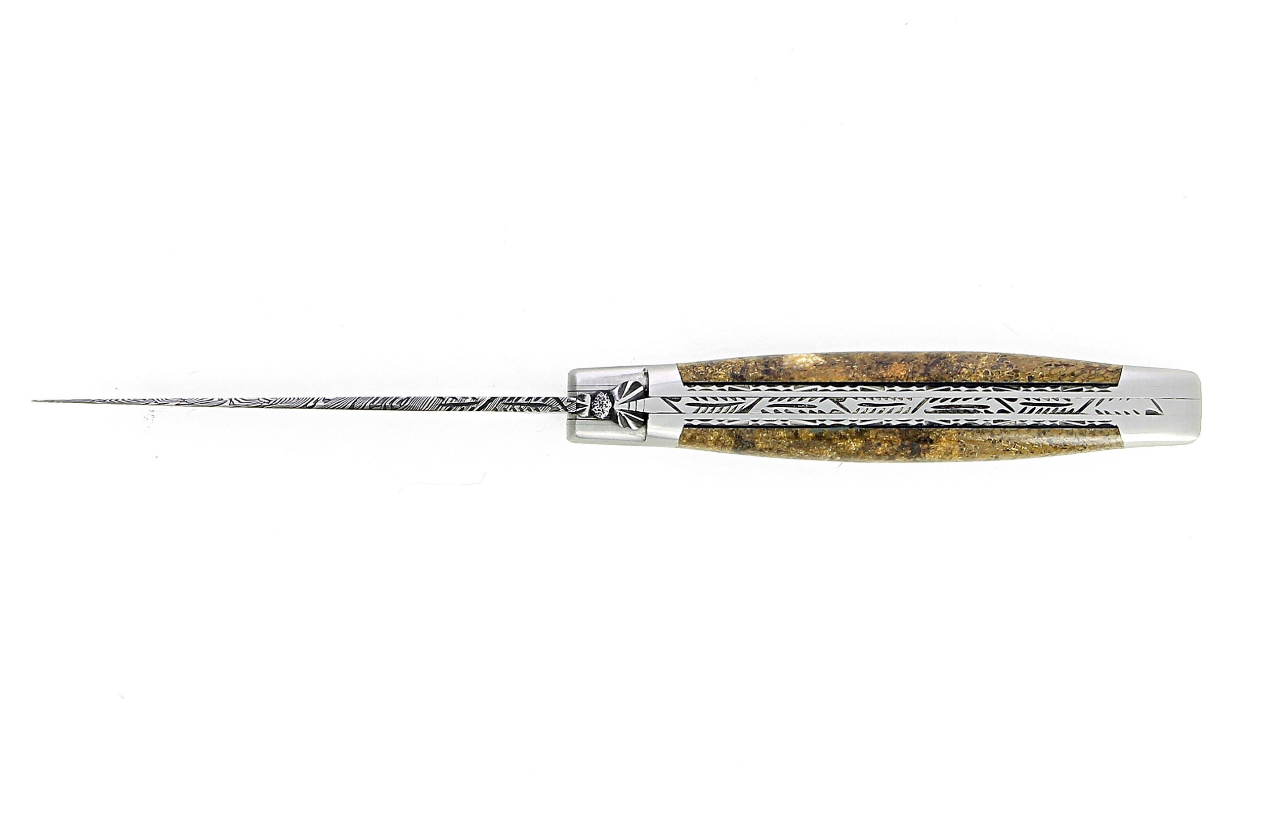Couteau de Laguiole en os de dinosaure lame damas