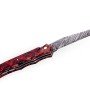 Ce couteau de Laguiole Tribal pliant est doté d'un plein manche de 12 cm en loupe d'erable négundo stabilisé, de platines guillochées et monté avec une lame damas carbone.